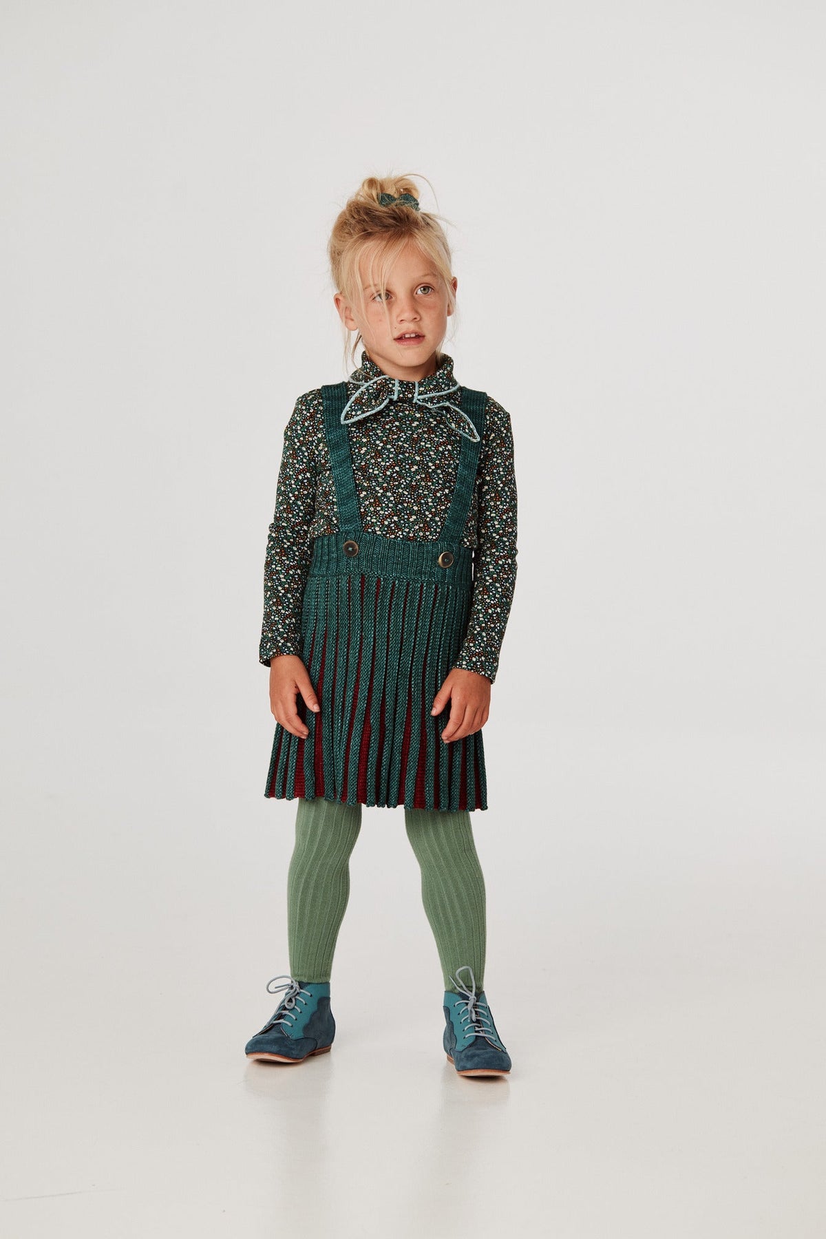 Accordion Pleat Pinafore - Peacock+Model is 41 inches tall, 38lbs, wearing a size 4-5y
