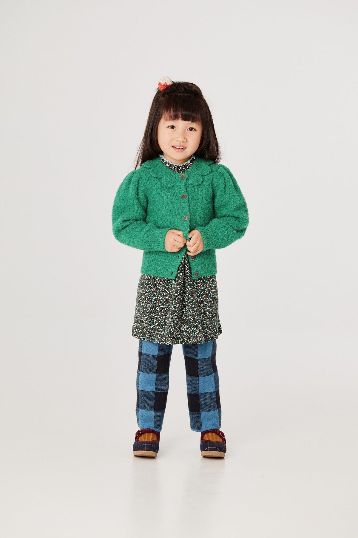 Boucle Flower Ellie Cardigan - Emerald+Model is 41 inches tall, 38lbs, wearing a size 4-5y