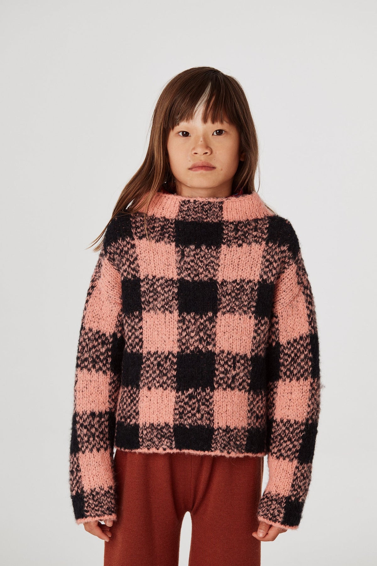 Boucle Plaid Pullover - Grapefruit+Model is 48 inches tall, 51lbs, wearing a size 7-8y
