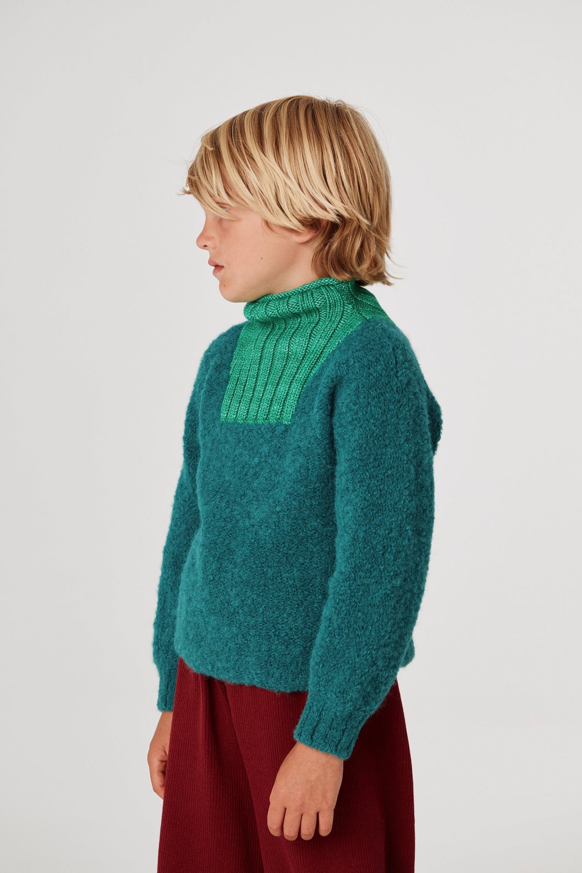 Boucle Ski Sweater - Peacock+Model is 48 inches tall, 48lbs, wearing a size 6-7y