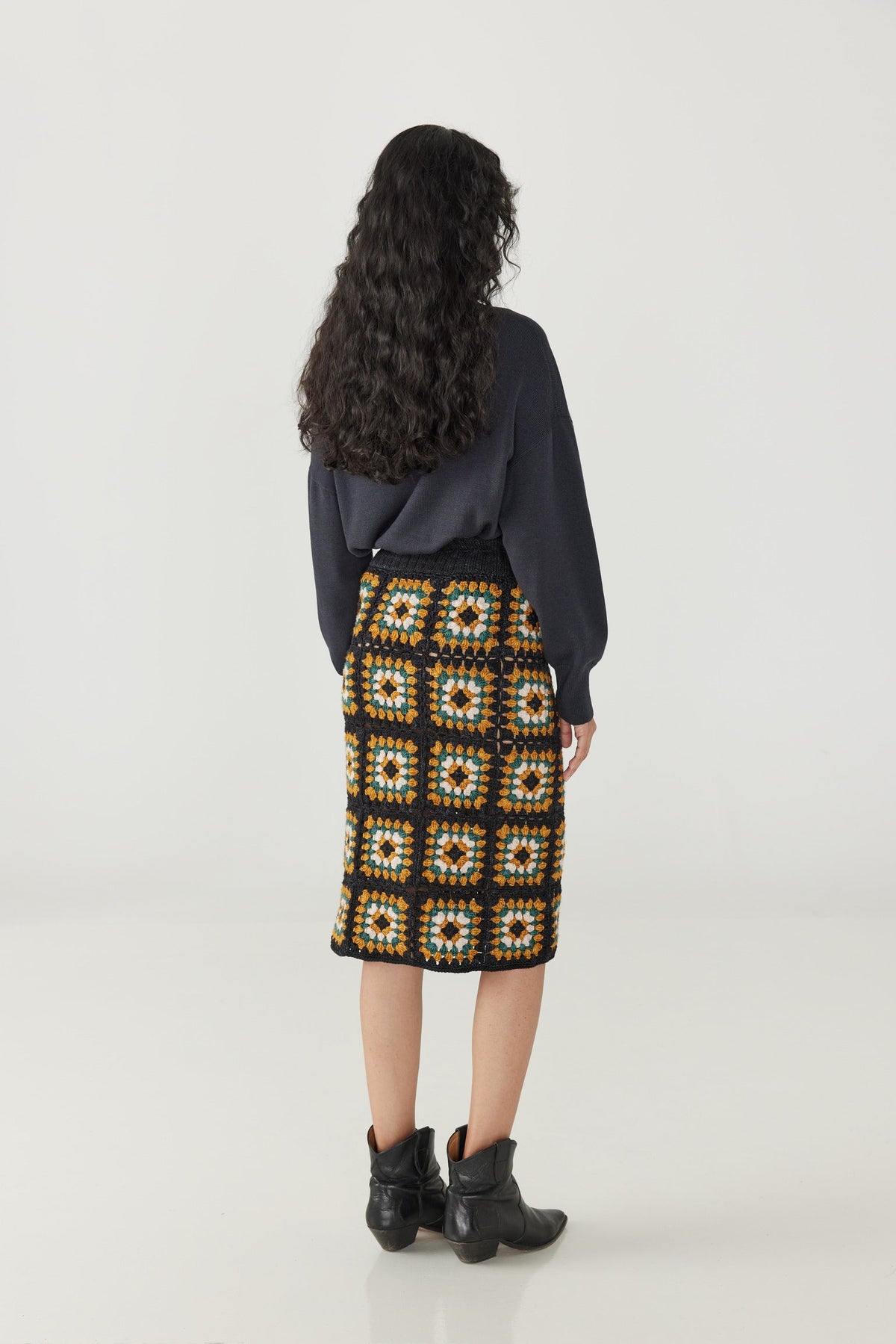 Adult Patchwork Crochet Skirt - Carbon+Model is 5&#39;9&quot; | 31&quot; Bust | 24&quot; Waist | 34&quot; Hips | size 2, wearing a size One Size