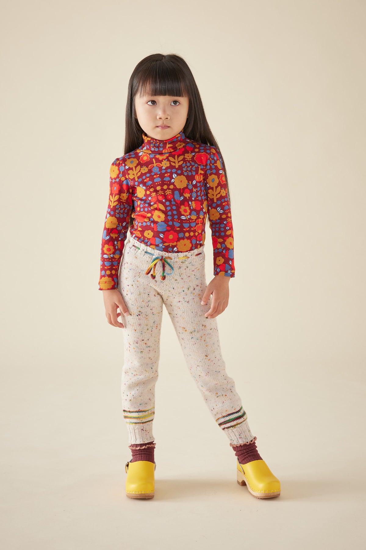 Snowy Day Leggings - Stained Glass Confetti+Model is 43 inches tall, 38lbs, wearing a size 4-5y