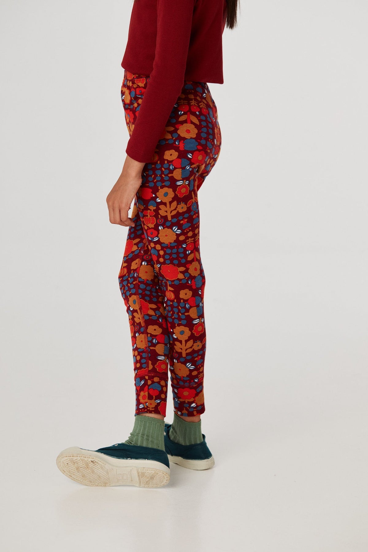 Legging with Rib Cuff - Cranberry Playground+Model is 51 inches tall, 53lbs, wearing a size 7-8y