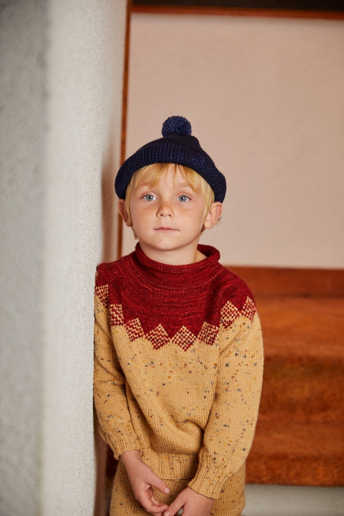 Pinecone Sweater - Camel Confetti+Model is 44 inches tall, 43lbs, wearing a size 4-5y