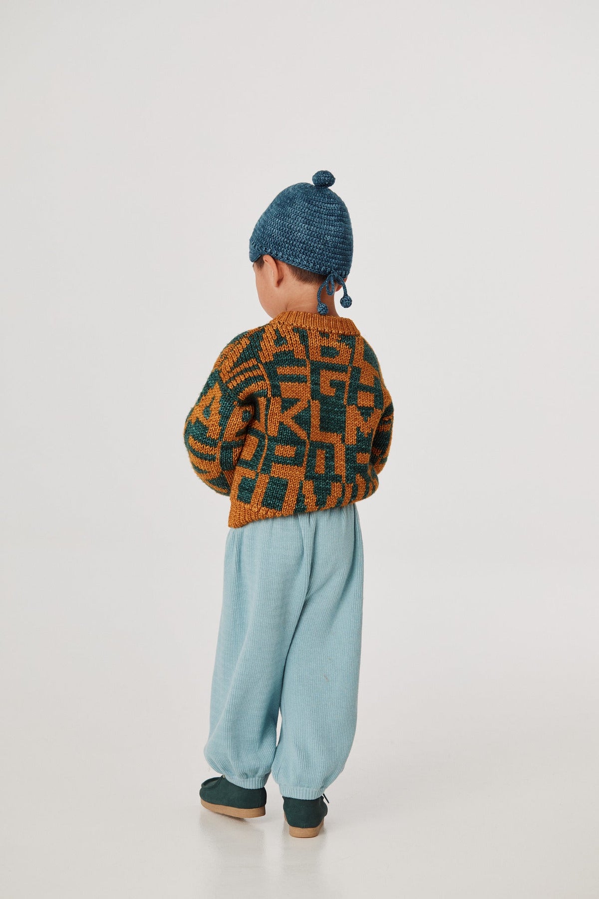 Alphabet Intarsia Sweater - Marigold+Model is 39 inches tall, 32lbs, wearing a size 3-4y