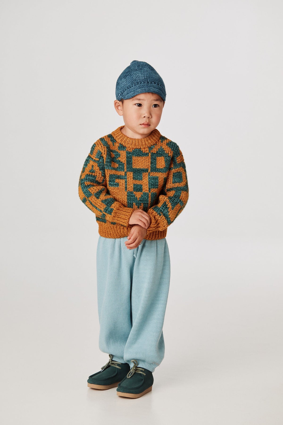 Alphabet Intarsia Sweater - Marigold+Model is 39 inches tall, 32lbs, wearing a size 3-4y