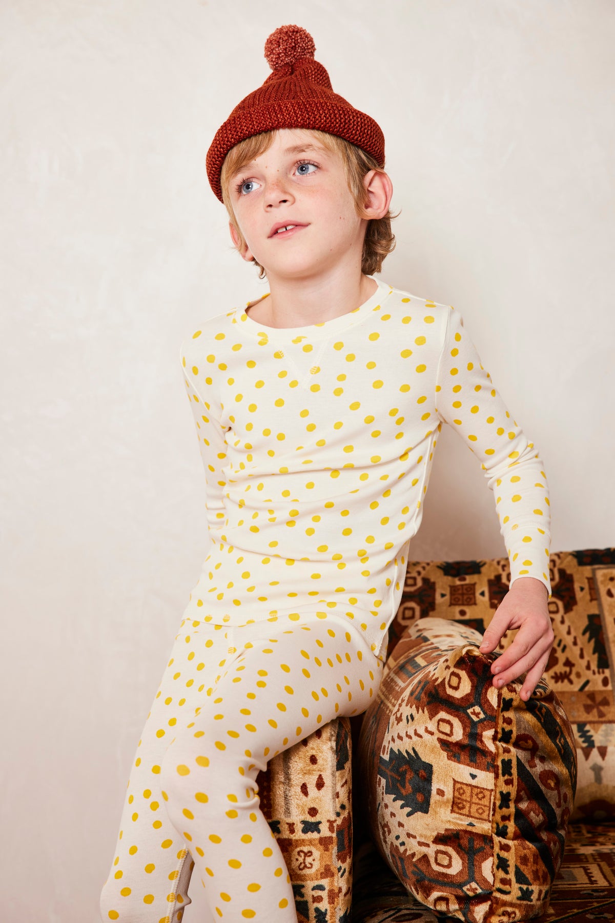Pajama Set - Winter Cream Polka Dot+Model is 47 inches tall, 45lbs, wearing a size 6-7y