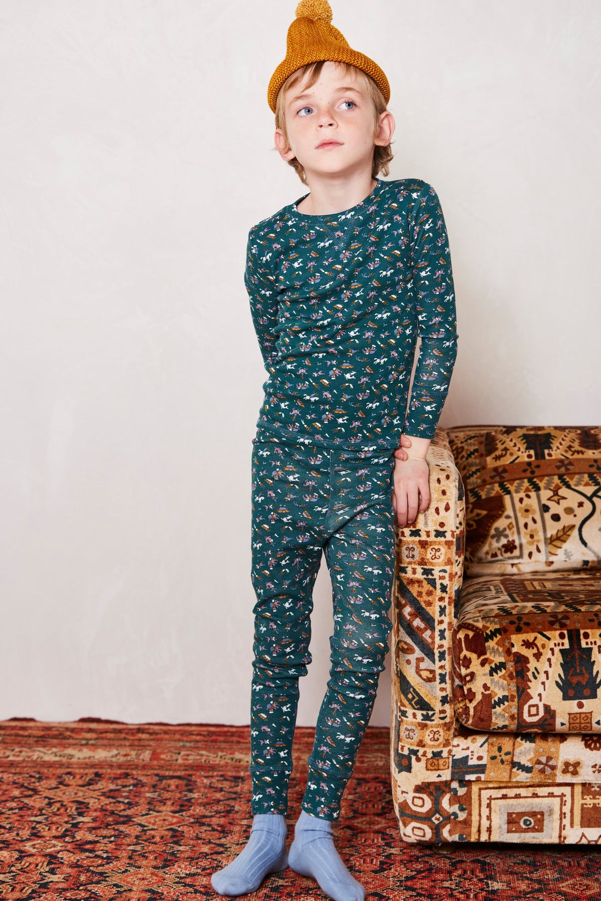Pajama Set - Peacock Circus+Model is 47 inches tall, 45lbs, wearing a size 6-7y