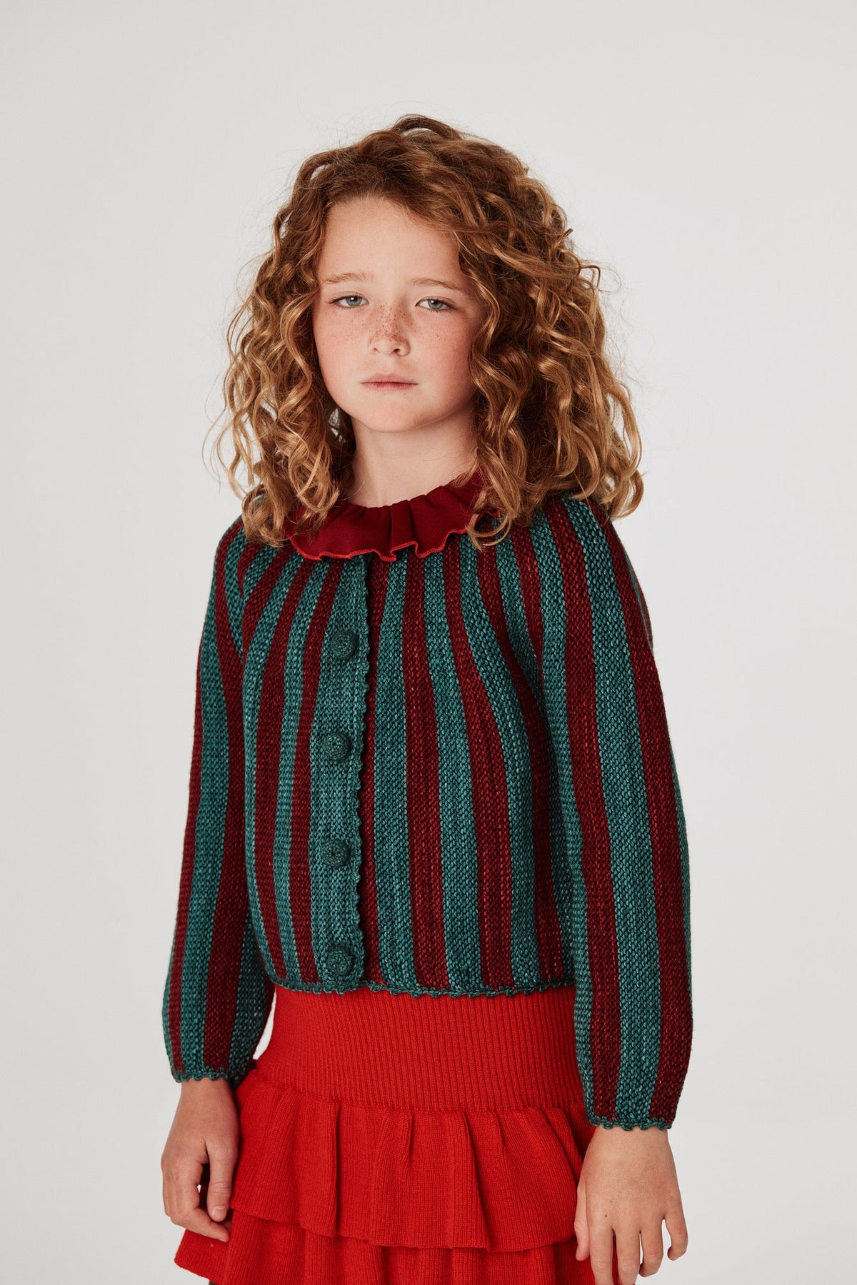 Short Circus Cardigan - Peacock+Model is 53 inches tall, 58lbs, wearing a size 7-8y