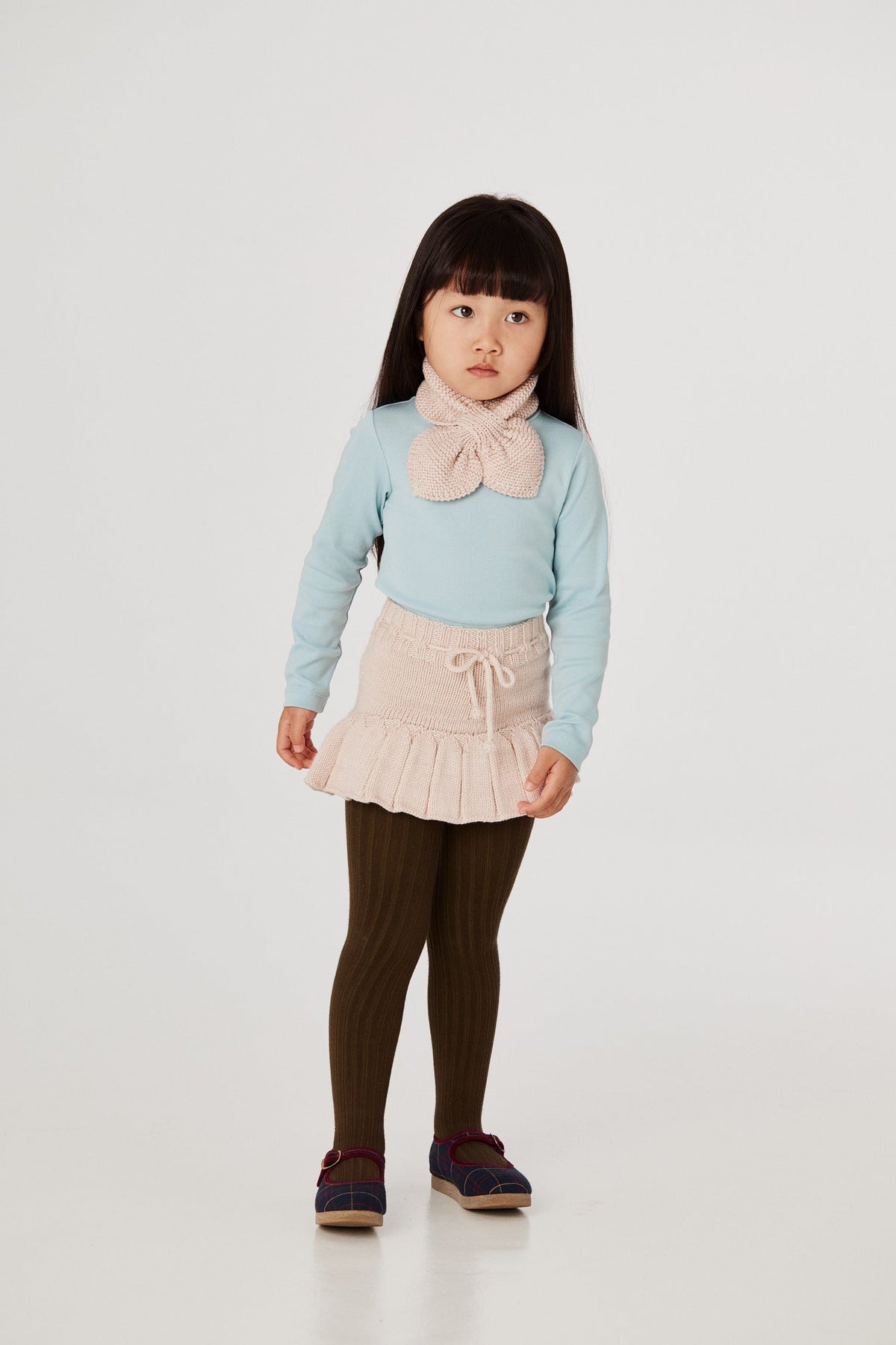Skating Pond Skirt - Dune+Model is 41 inches tall, 38lbs, wearing a size 4-5y