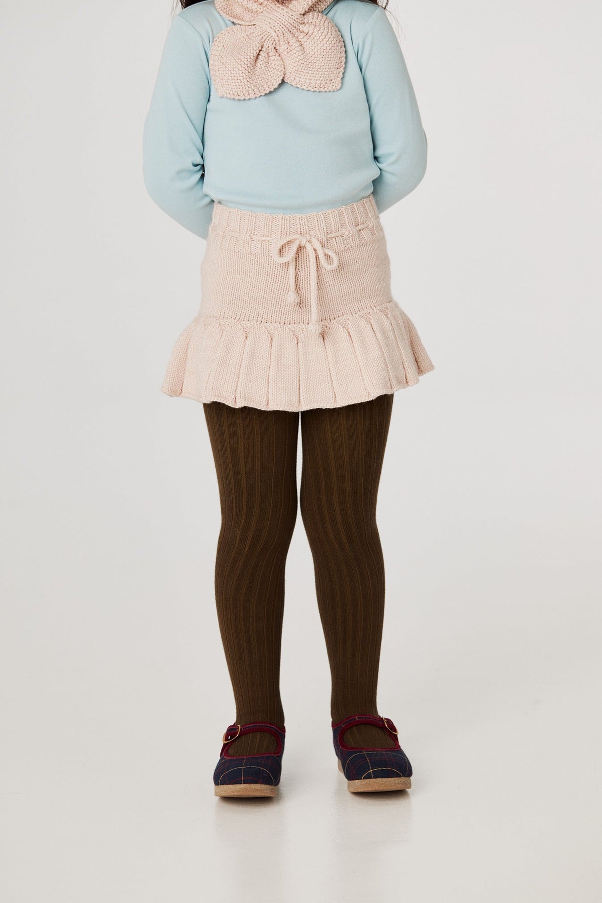 Skating Pond Skirt - Dune+Model is 41 inches tall, 38lbs, wearing a size 4-5y